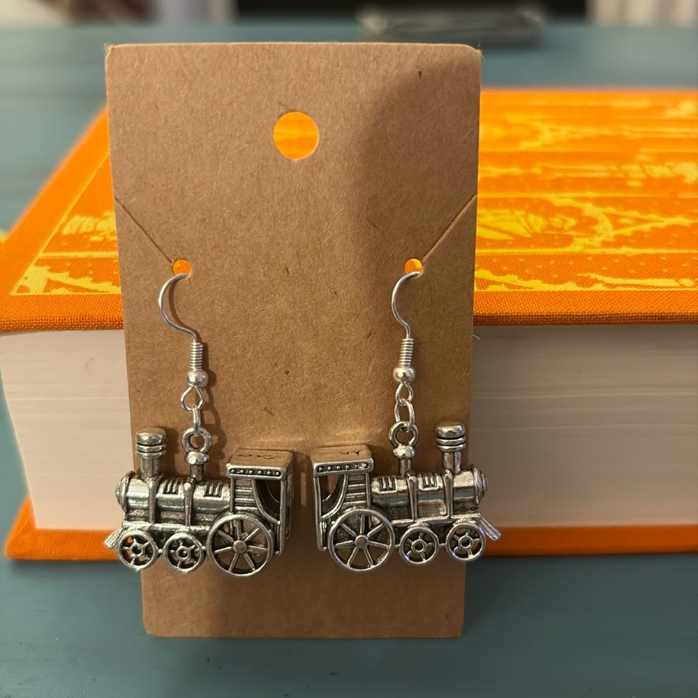 Super cute, hypoallergenic silver Train earrings.